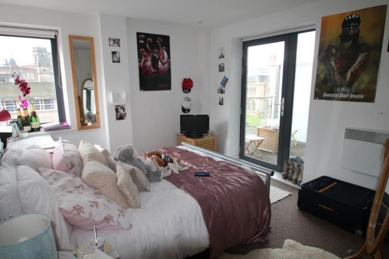 Property photo 1 of 9 Bright And Inviting Master Bedroom Featuring A Coz...