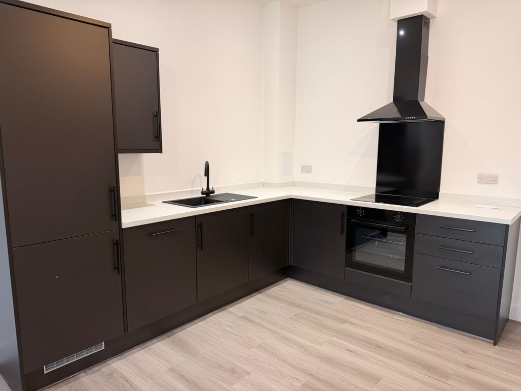 Property photo 2 of 8 Kitchen