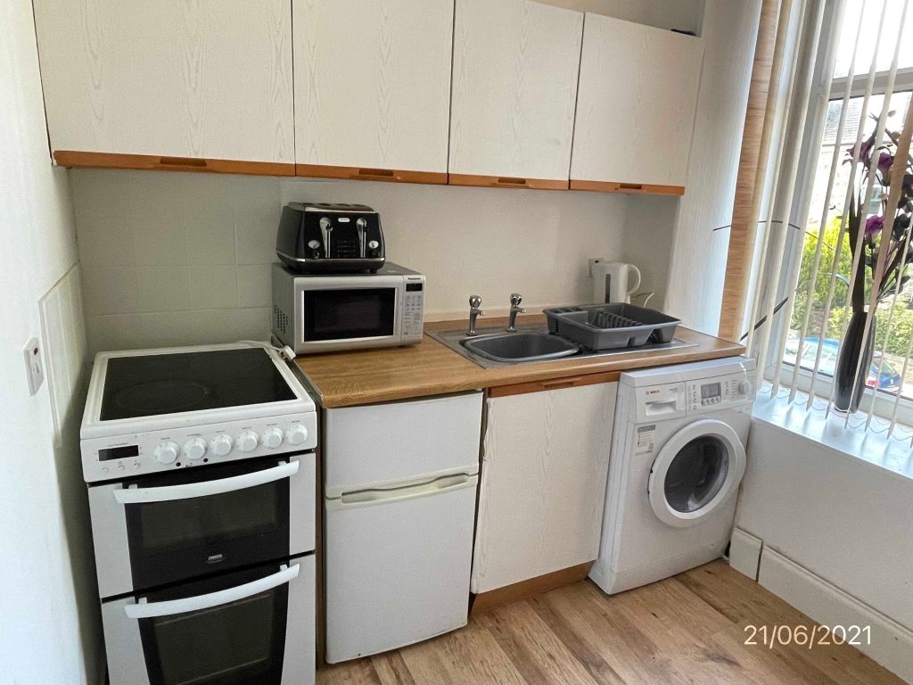 Property photo 2 of 7 Kitchen