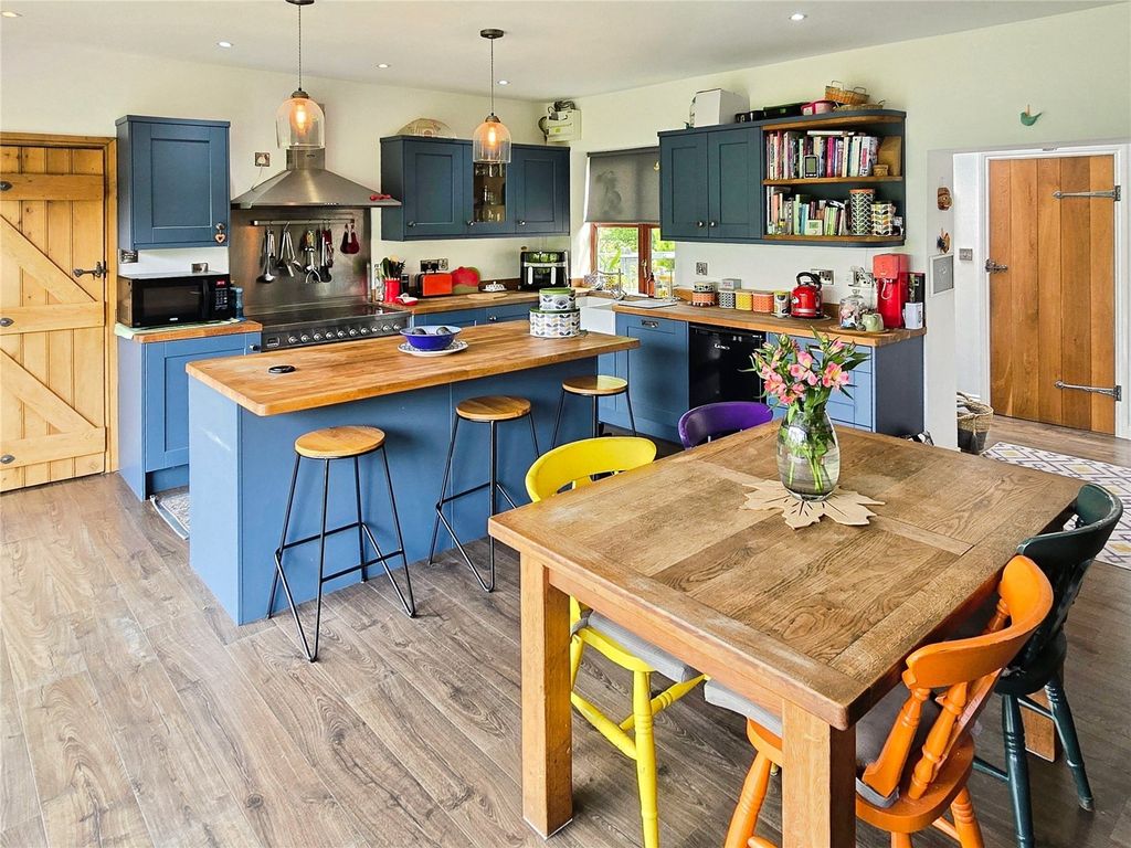 Property photo 2 of 24 Dining Kitchen