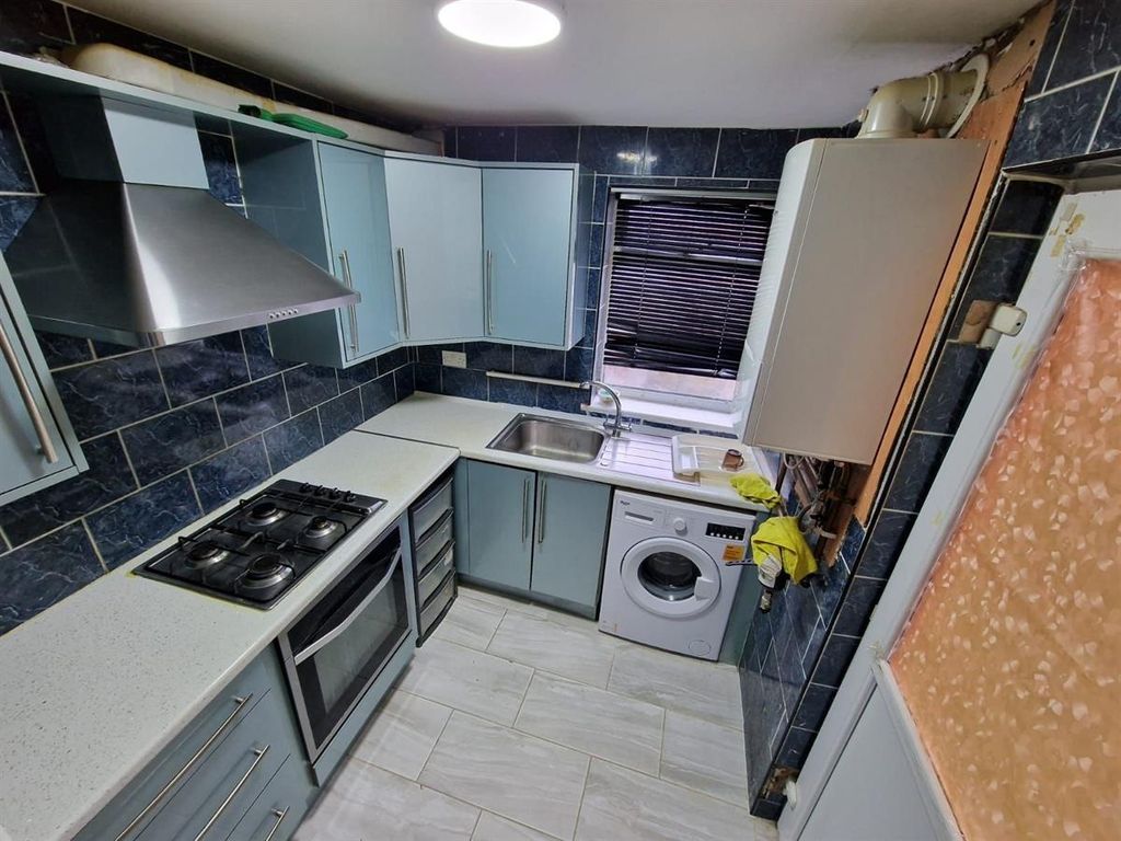 Property photo 3 of 6 Sleek Kitchen With Built-In Appliances And Oven...
