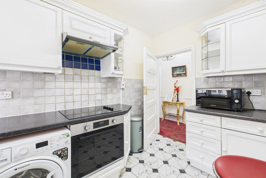 Property photo 3 of 12 Kitchen