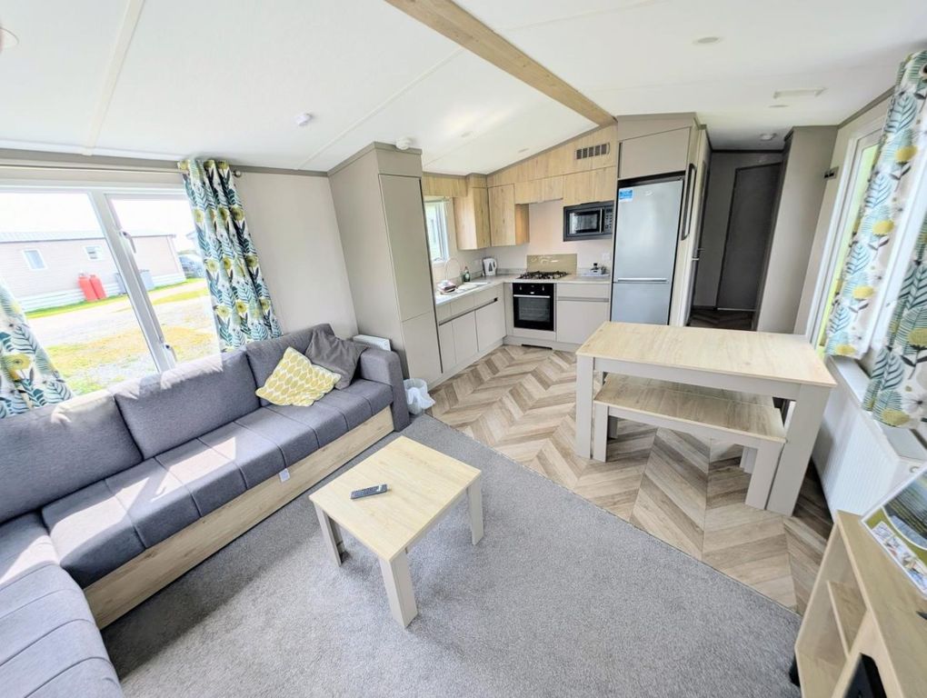 Property photo 2 of 10 Modern Open Plan Kitchen, Dining And Living Area With Integrated Appliances