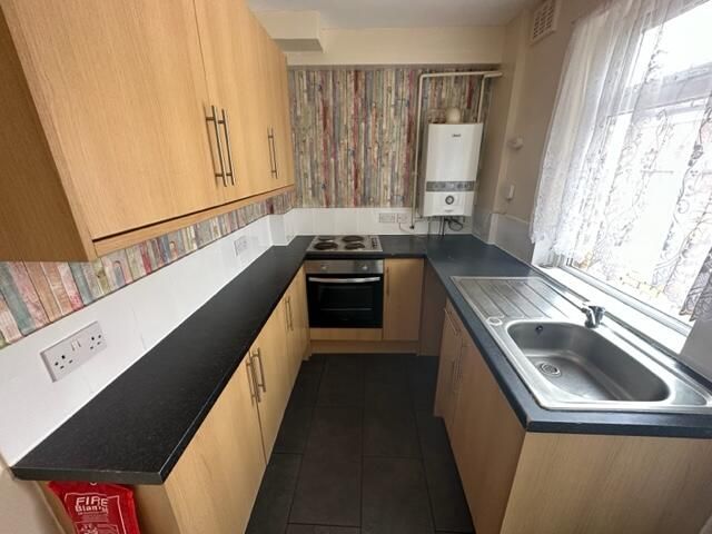 Property photo 3 of 7 Kitchen
