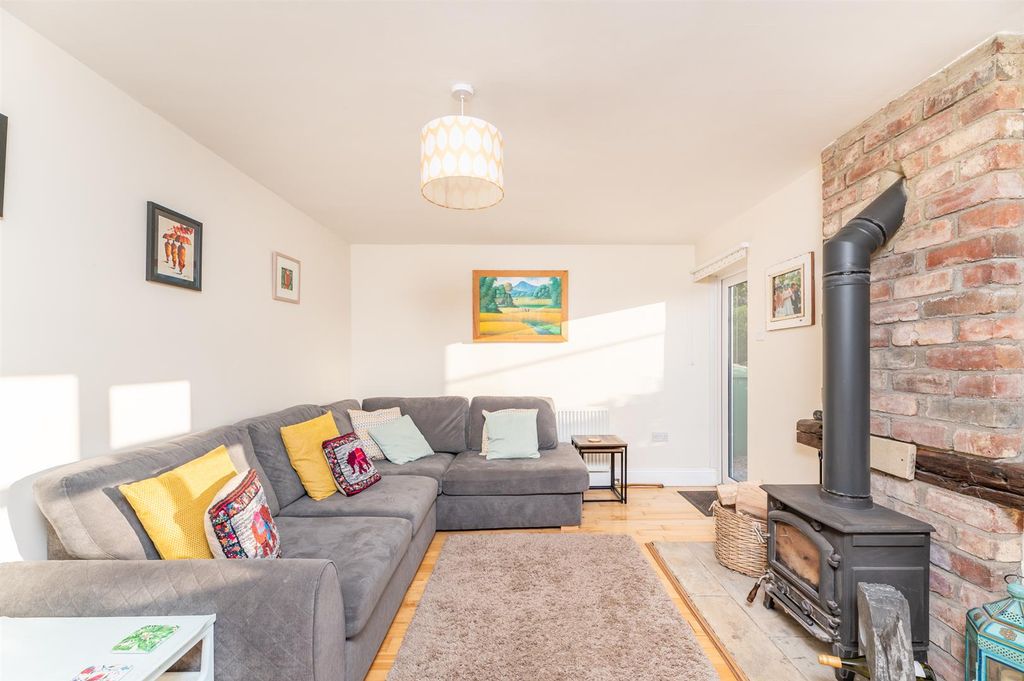 Property photo 3 of 42 Sitting Room With Wood Burner