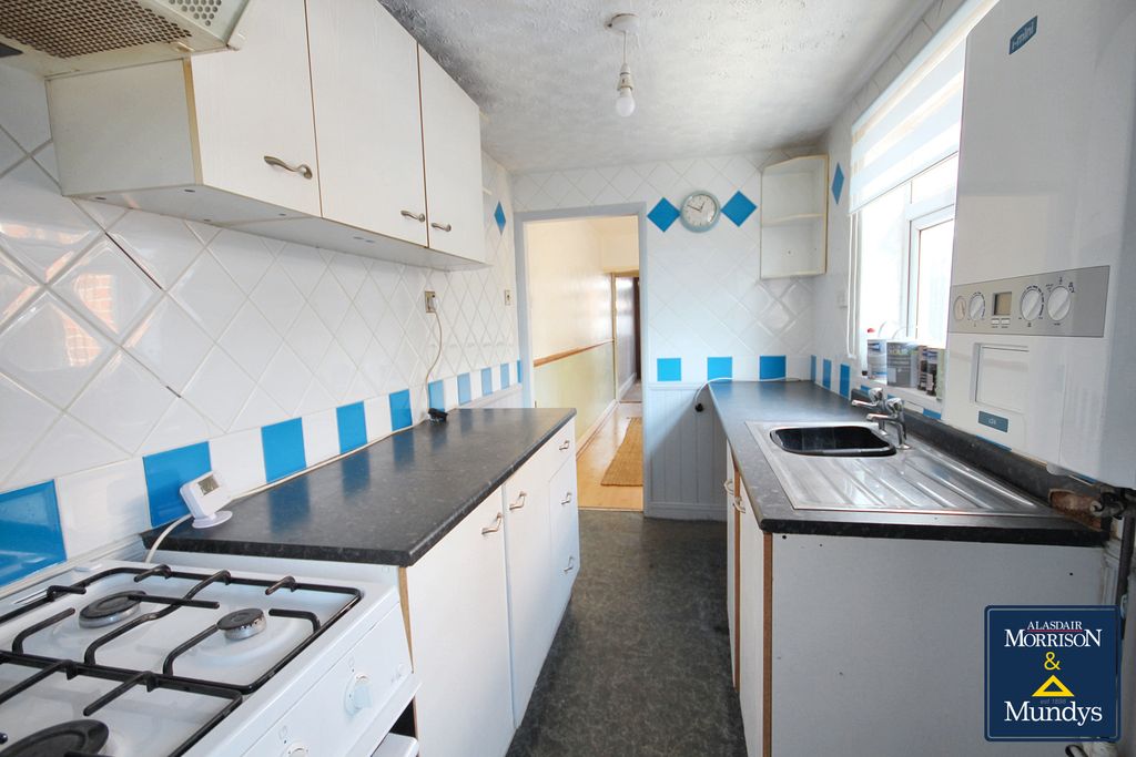 Property photo 3 of 13 Kitchen