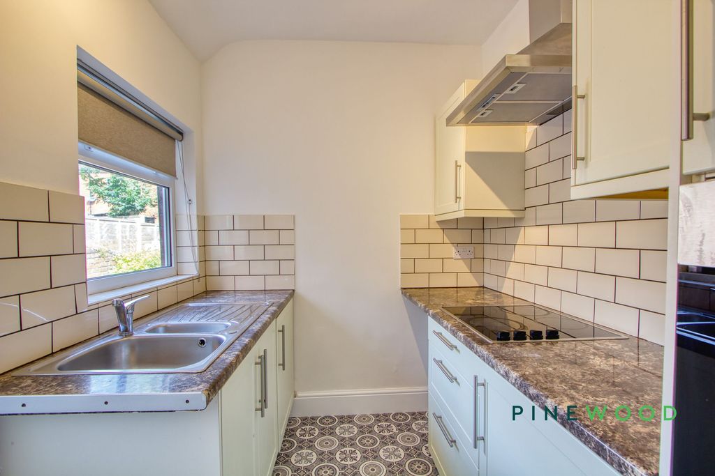 Property photo 3 of 17 Kitchen