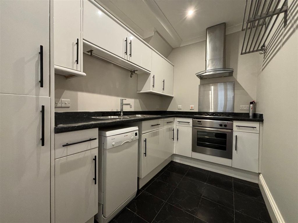 Property photo 2 of 12 Kitchen