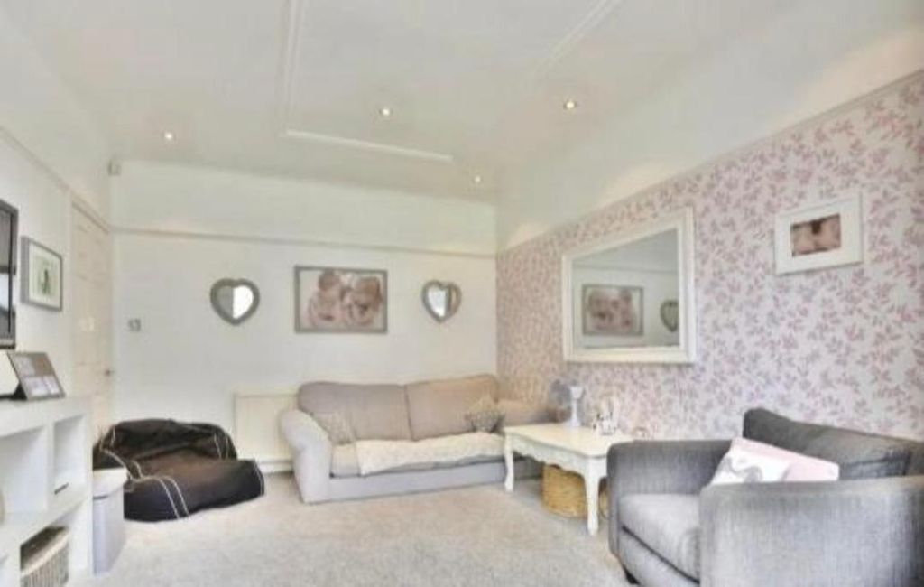 Property photo 3 of 14 Bright Lounge With Floral Wall And Plush Seating...
