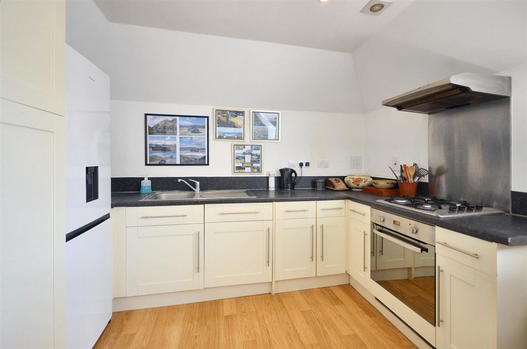 Property photo 3 of 9 Kitchen Area