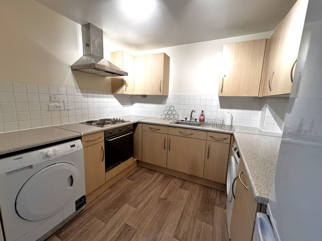 Property photo 3 of 10 Kitchen