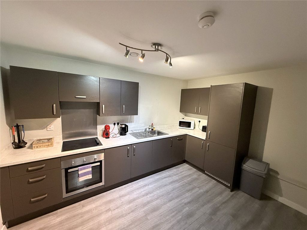 Property photo 3 of 8 Kitchen