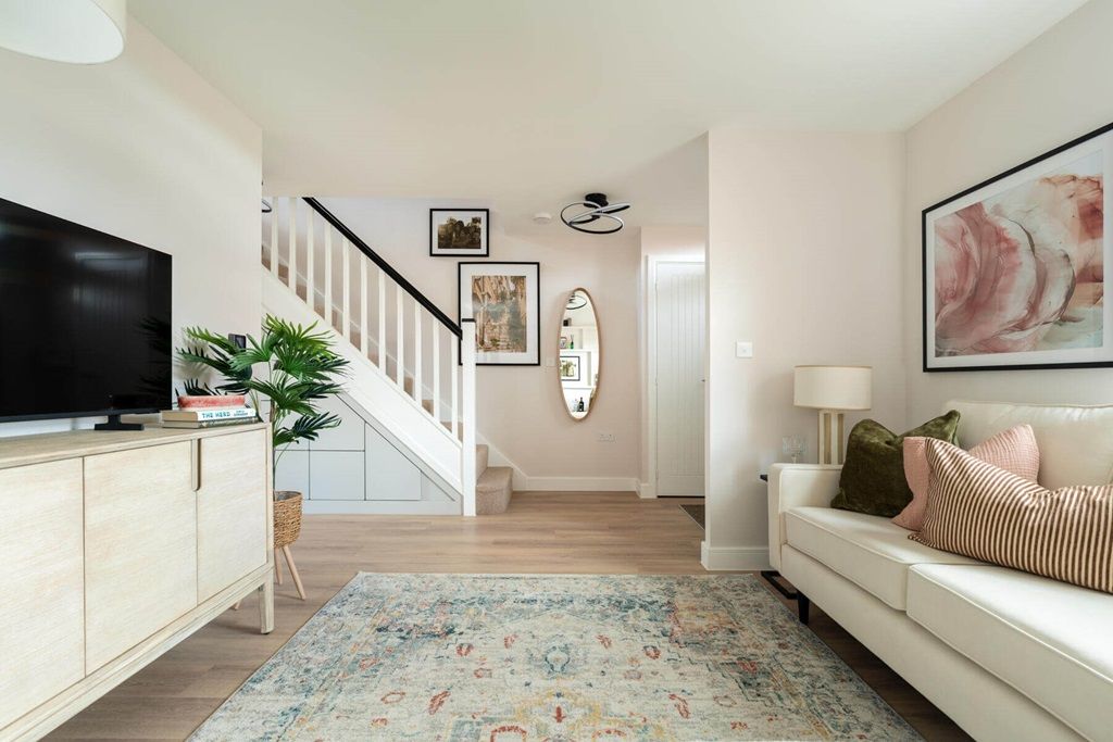 Property photo 3 of 15 A Bright And Open Lounge Is The Perfect Space For The Family To Unwind Together
