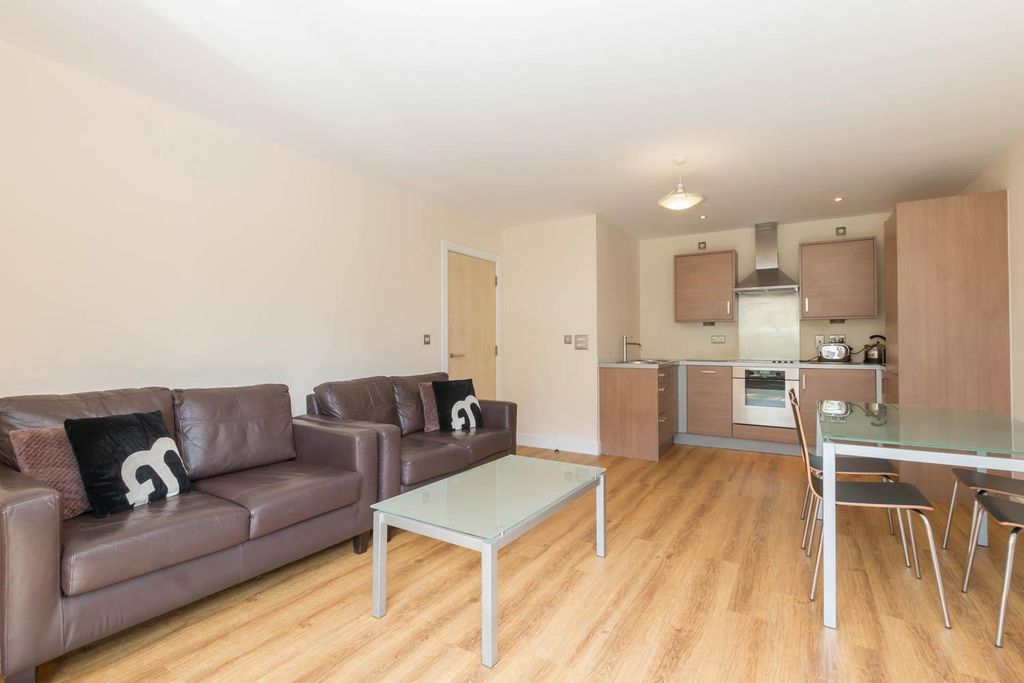 Property photo 3 of 12 Living Area
