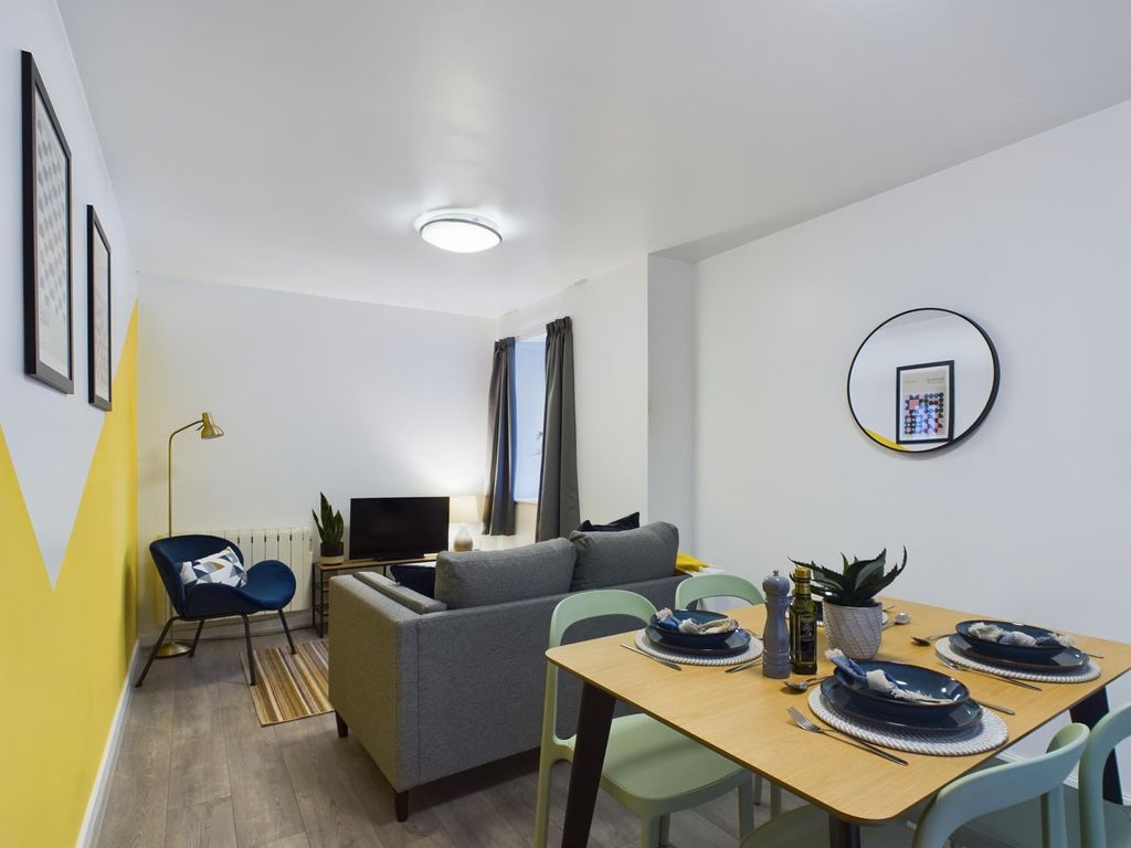 Property photo 3 of 22 Bright, Modern Living Area With A Comfortable Sofa...