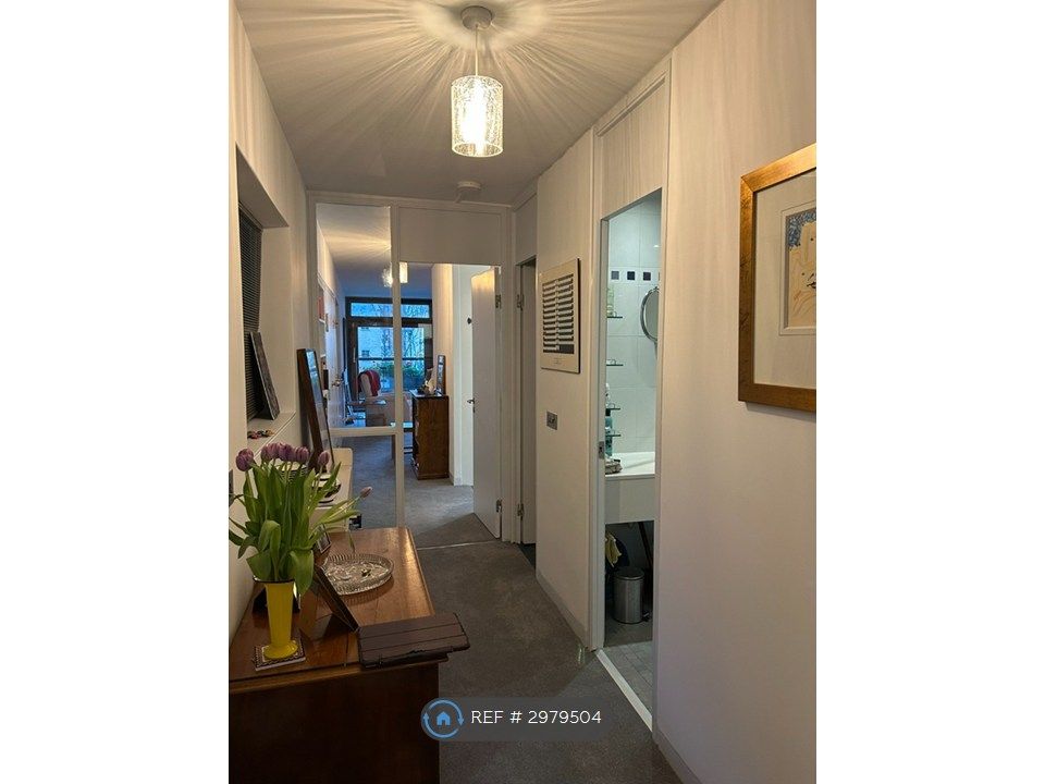 Property photo 3 of 7 Hallway Towards Entrance And Living Room