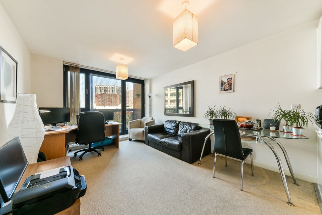 Property photo 1 of 10 Living Area