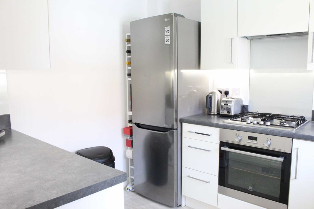 Property photo 3 of 13 Kitchen