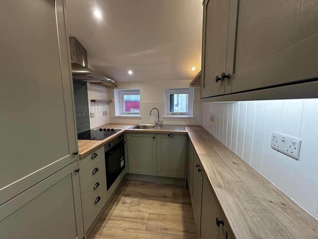 Property photo 3 of 13 Kitchen