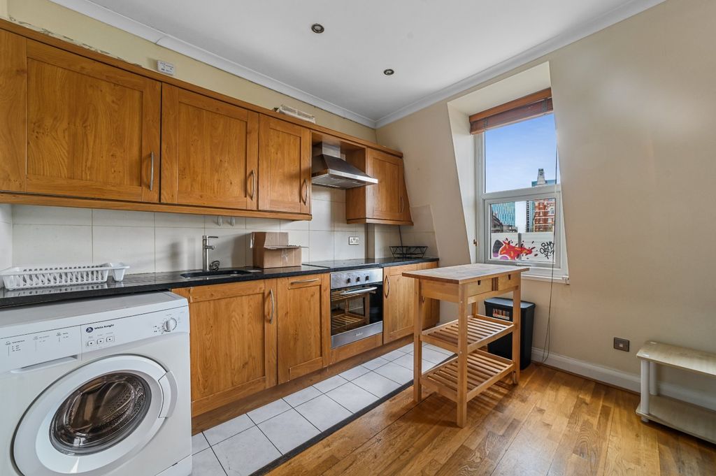 Property photo 3 of 7 Kitchen