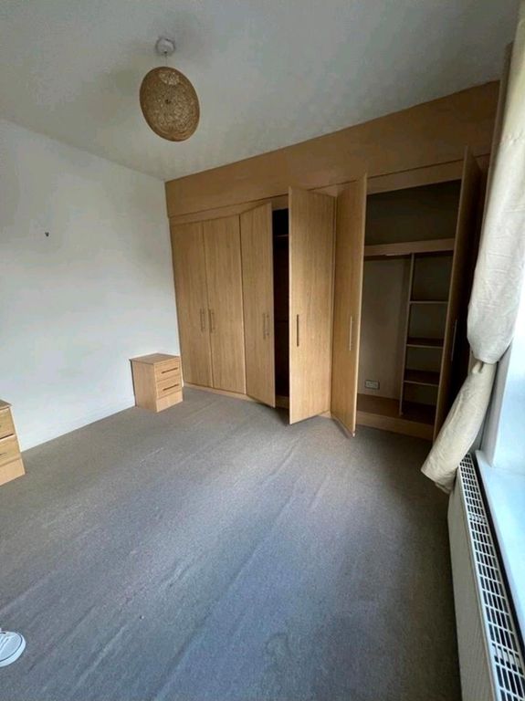 Property photo 3 of 7 Bright Bedroom With Built-In Wardrobes And Window...