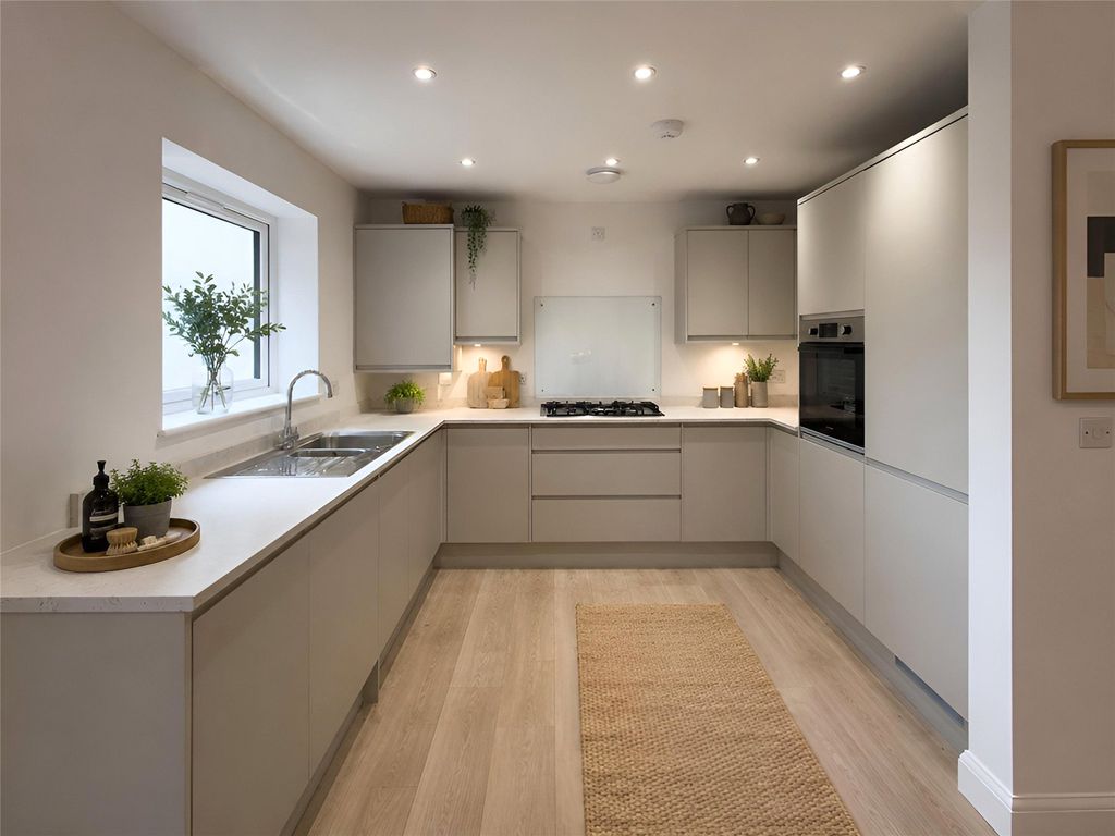 Property photo 3 of 12 Kitchen
