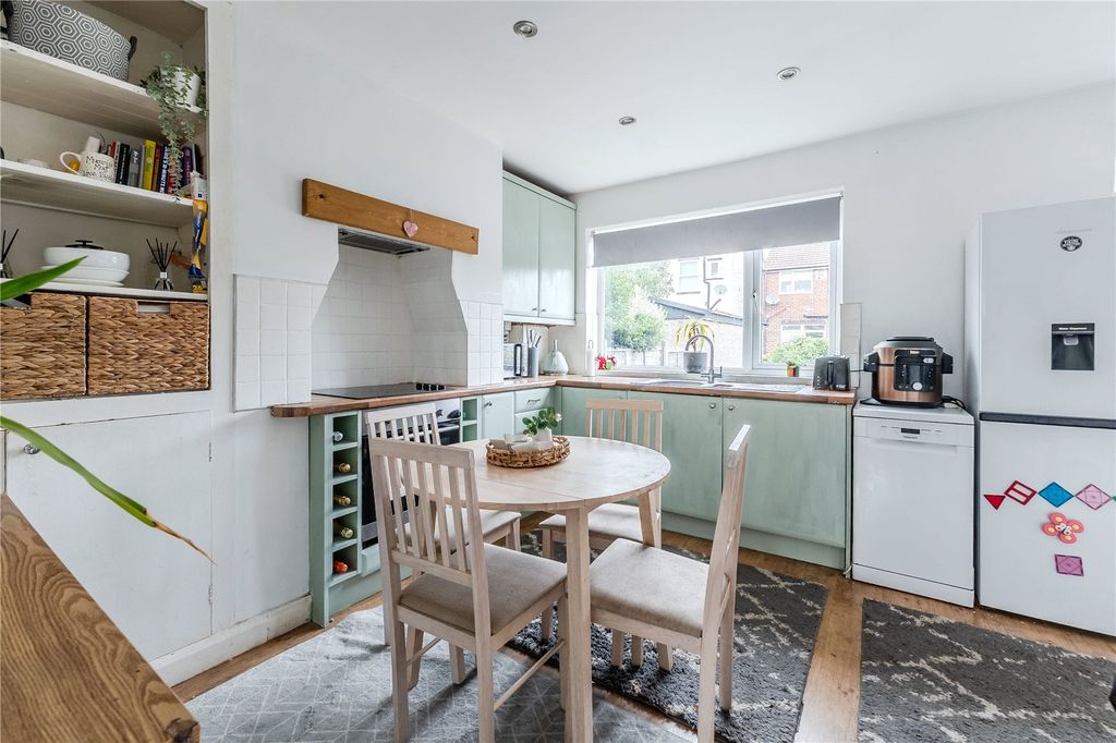 Property photo 3 of 12 Dining Kitchen