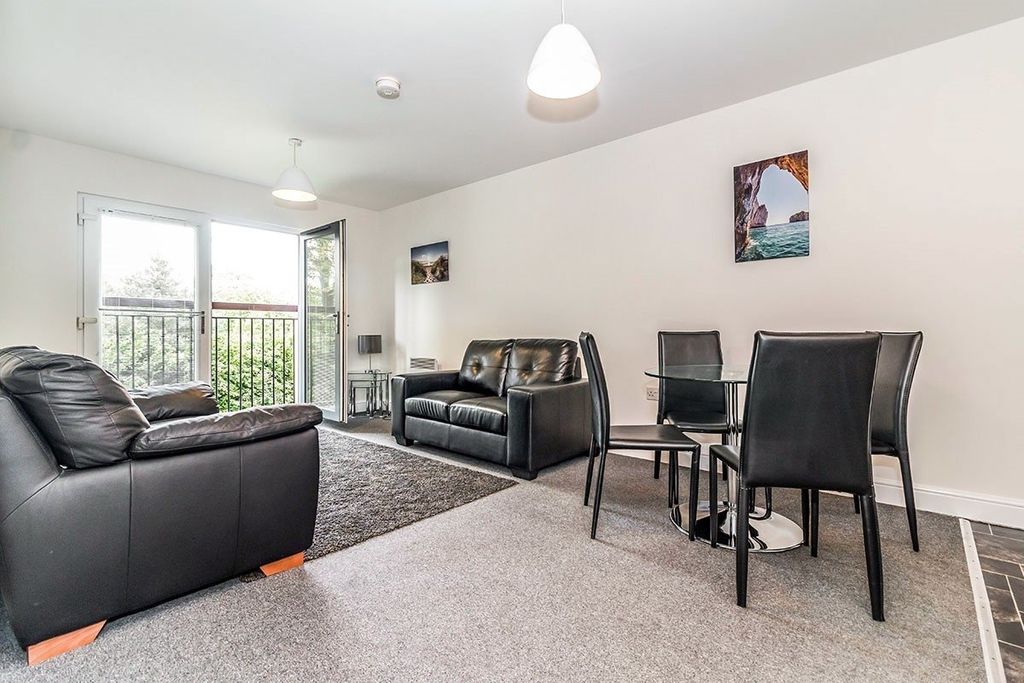 Property photo 2 of 10 Living Area