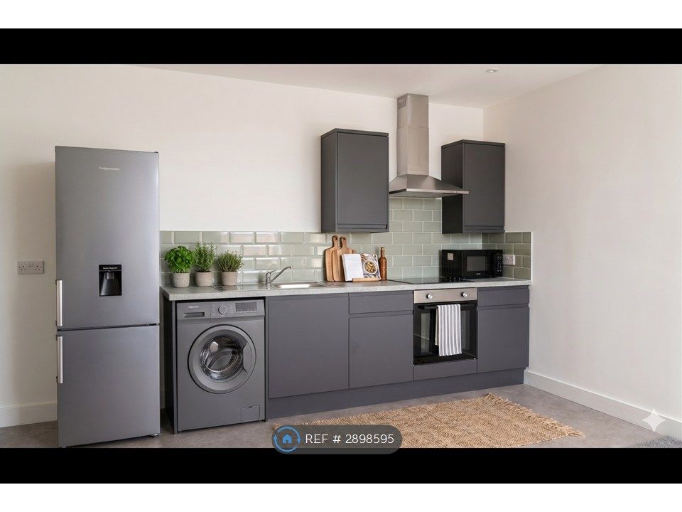 Property photo 3 of 9 Kitchen Area