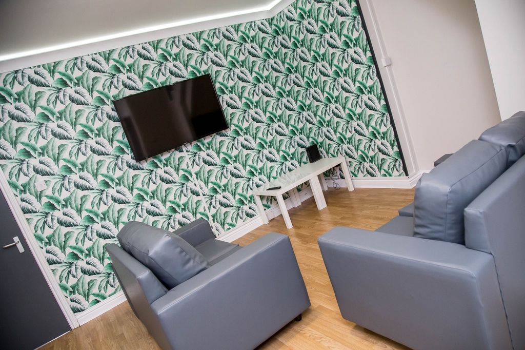 Property photo 2 of 9 A Stylish Living Room Featuring Modern Furniture, ...