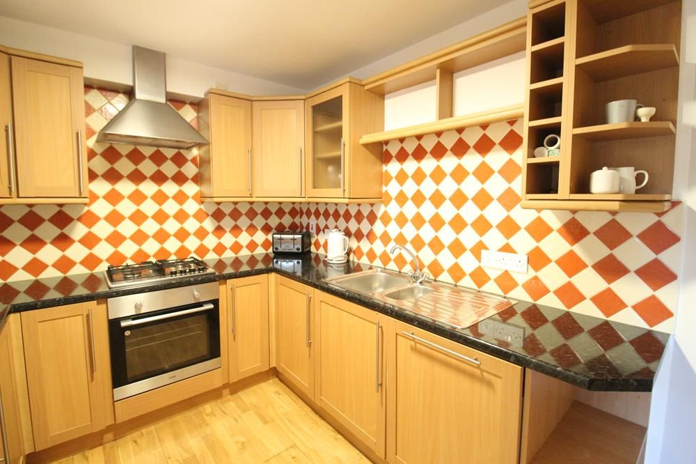 Property photo 3 of 11 Kitchen