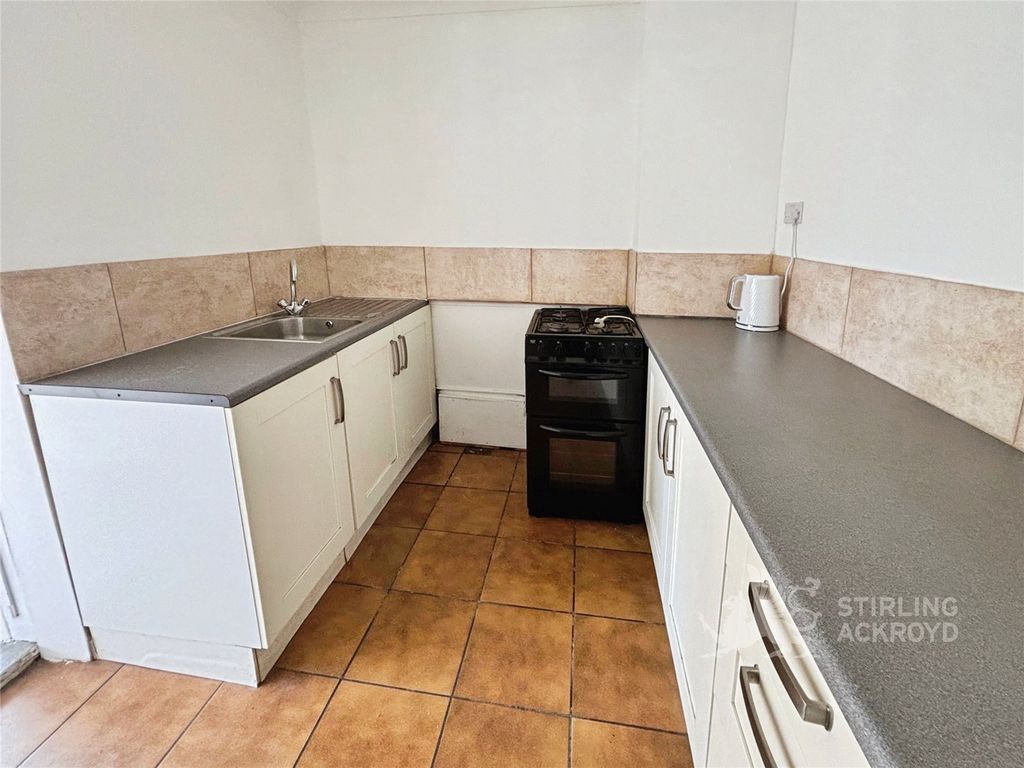 Property photo 3 of 12 Kitchen