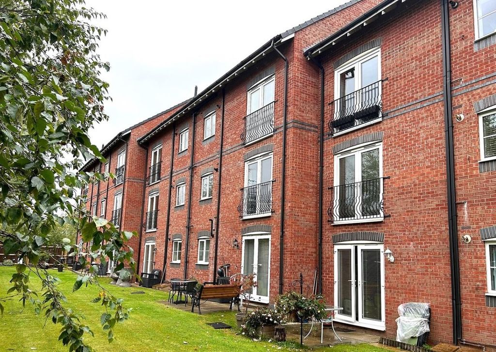 Property photo 2 of 11 Well-Maintained Communal Lawn And Patio Area Behin...