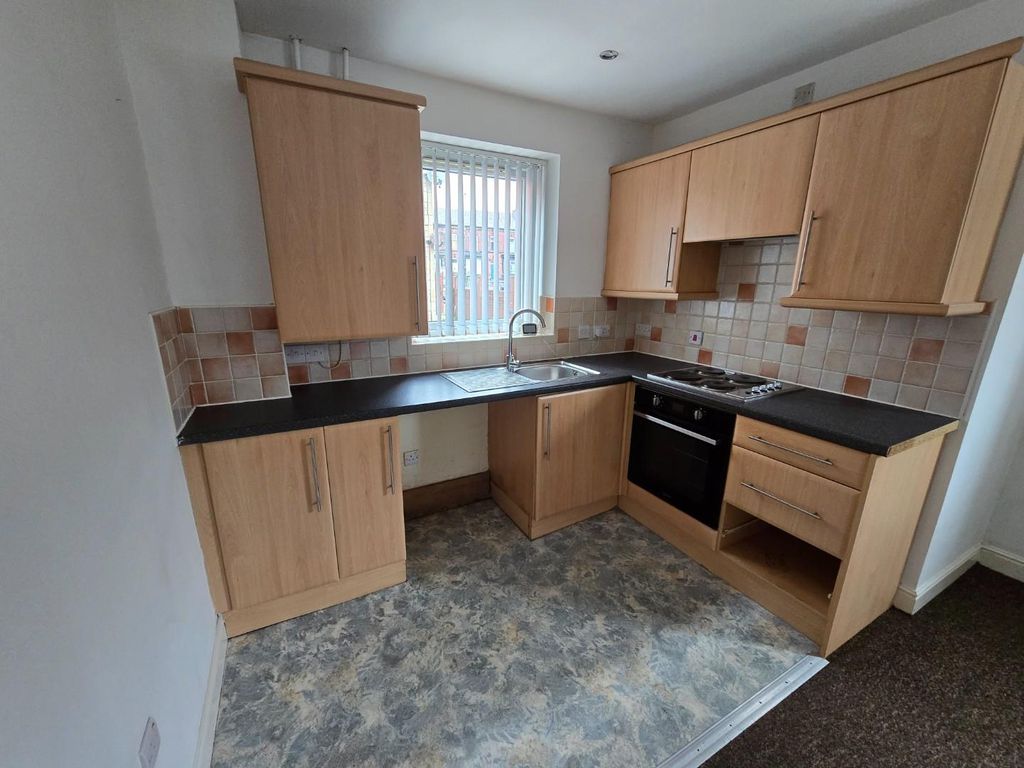 Property photo 3 of 7 Kitchen Area