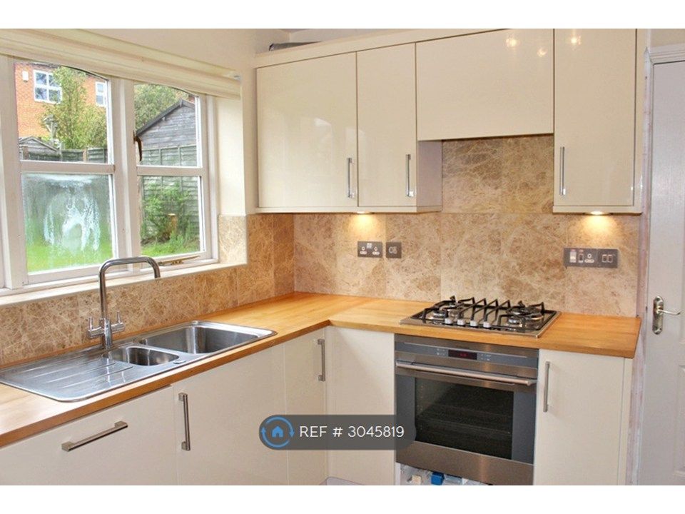Property photo 2 of 9 Kitchen With Pantry Storage And Dishwasher