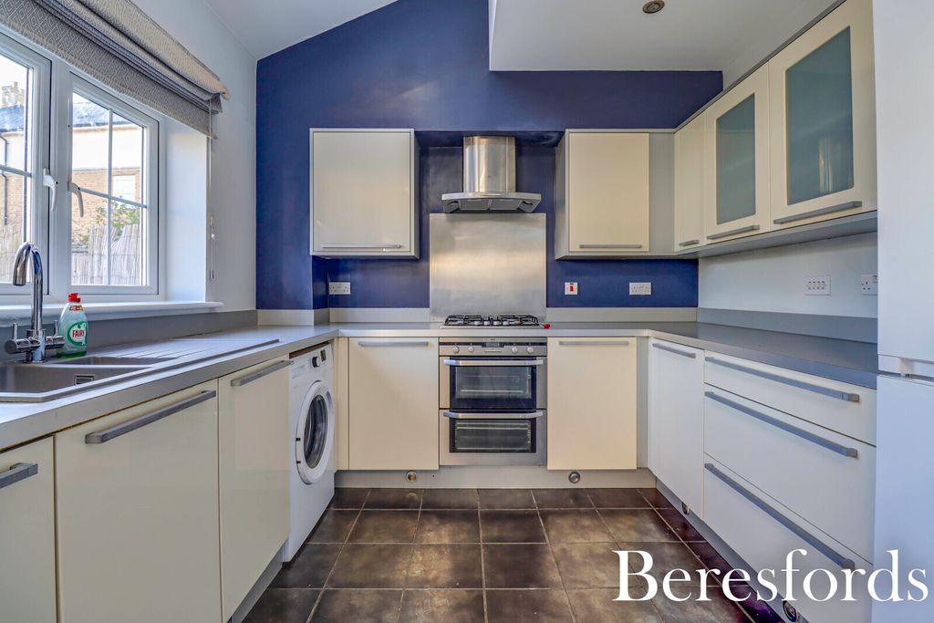 Property photo 3 of 12 Kitchen View 1