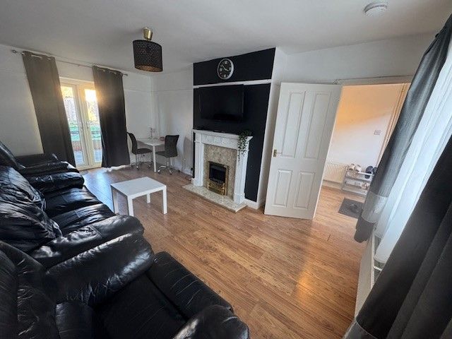 Property photo 3 of 12 Living Room