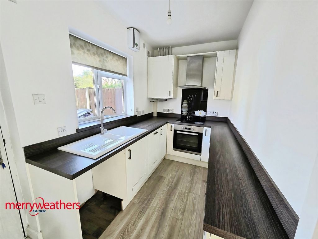 Property photo 2 of 12 Kitchen