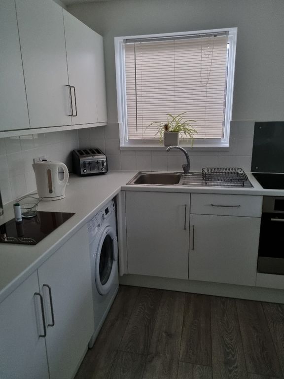 Property photo 3 of 8 Kitchen