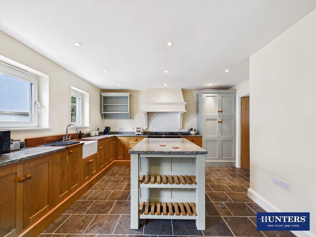 Property photo 2 of 27 Dining Kitchen