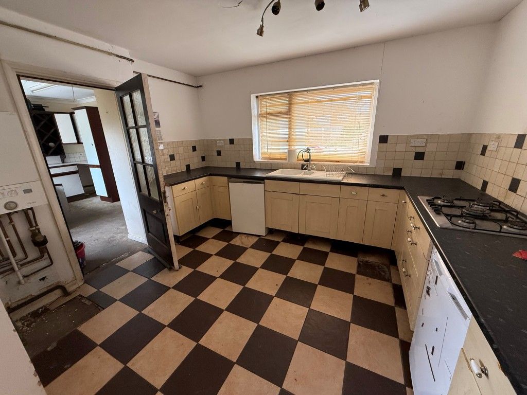 Property photo 3 of 14 Kitchen With Built In Cupboards And Window