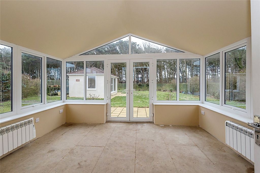Property photo 3 of 19 Sun Room 1