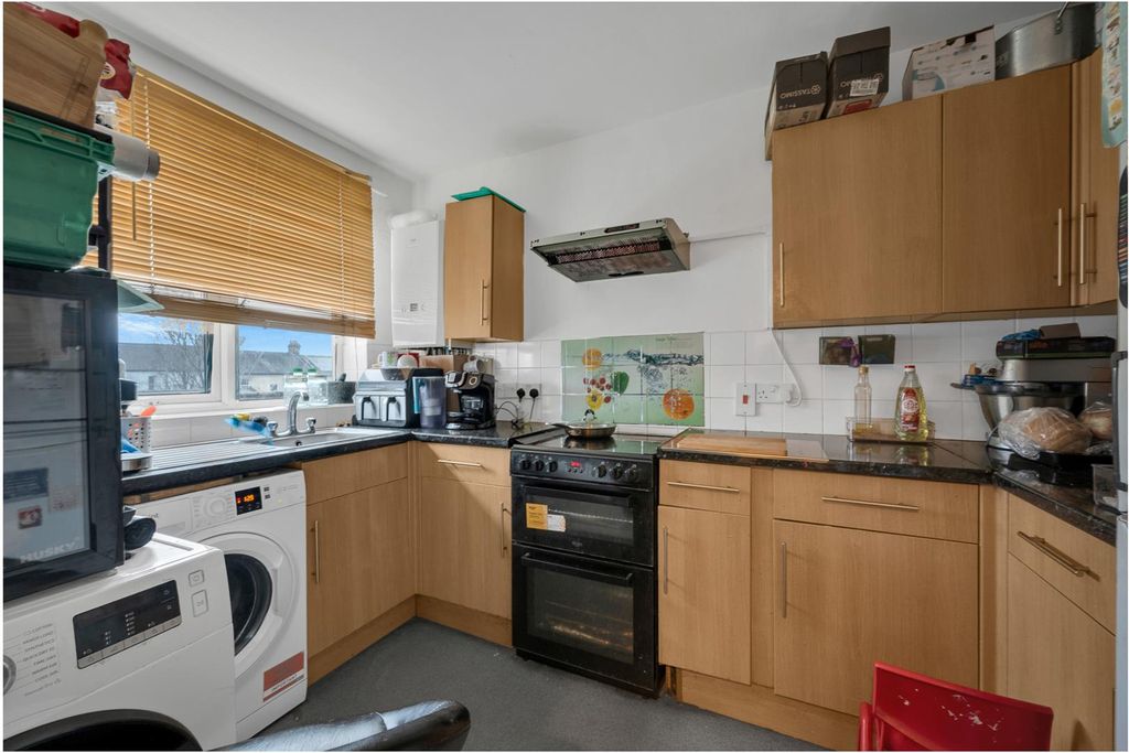 Property photo 3 of 9 Kitchen