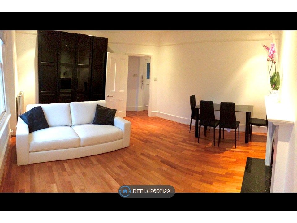 Property photo 3 of 8 Living Room With Furniture In Different Position