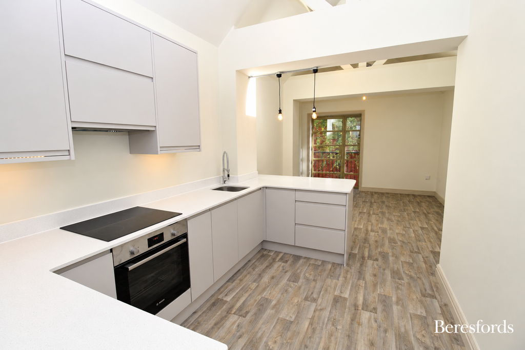 Property photo 2 of 8 Kitchen Area