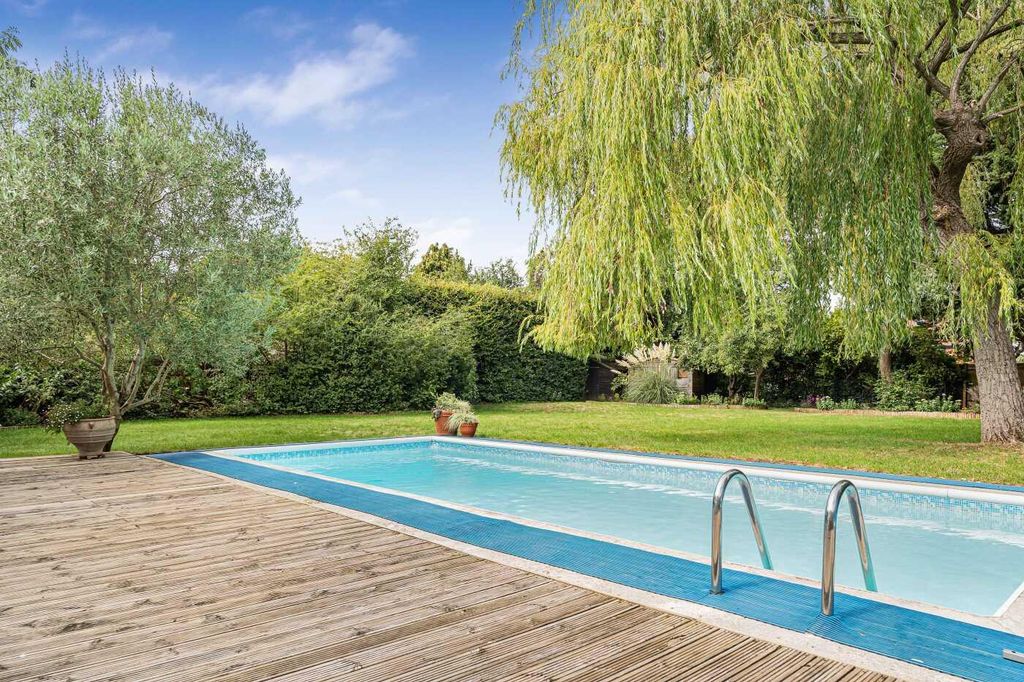 Property photo 2 of 23 Pool And Rear Garden