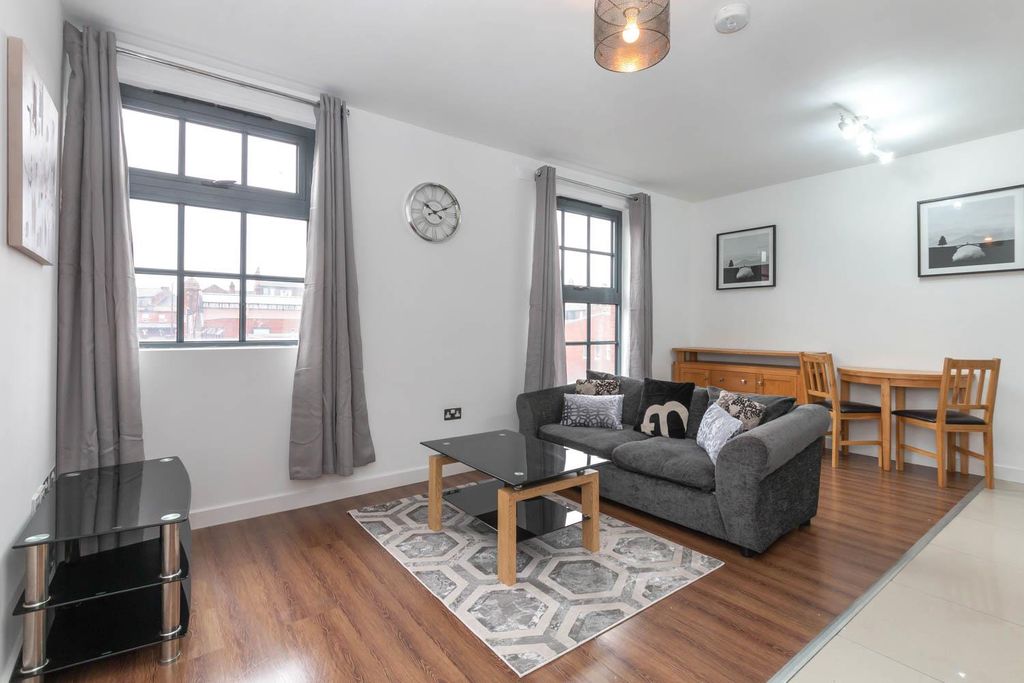 Property photo 1 of 13 Living Area