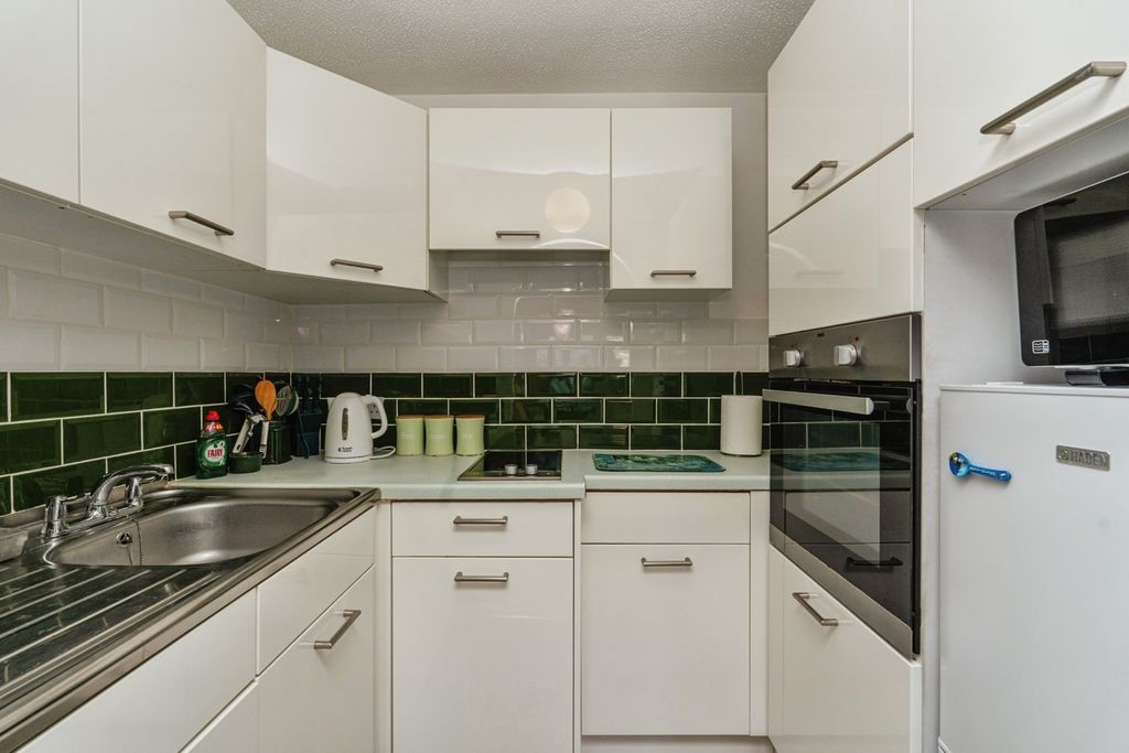 Property photo 3 of 12 Kitchen