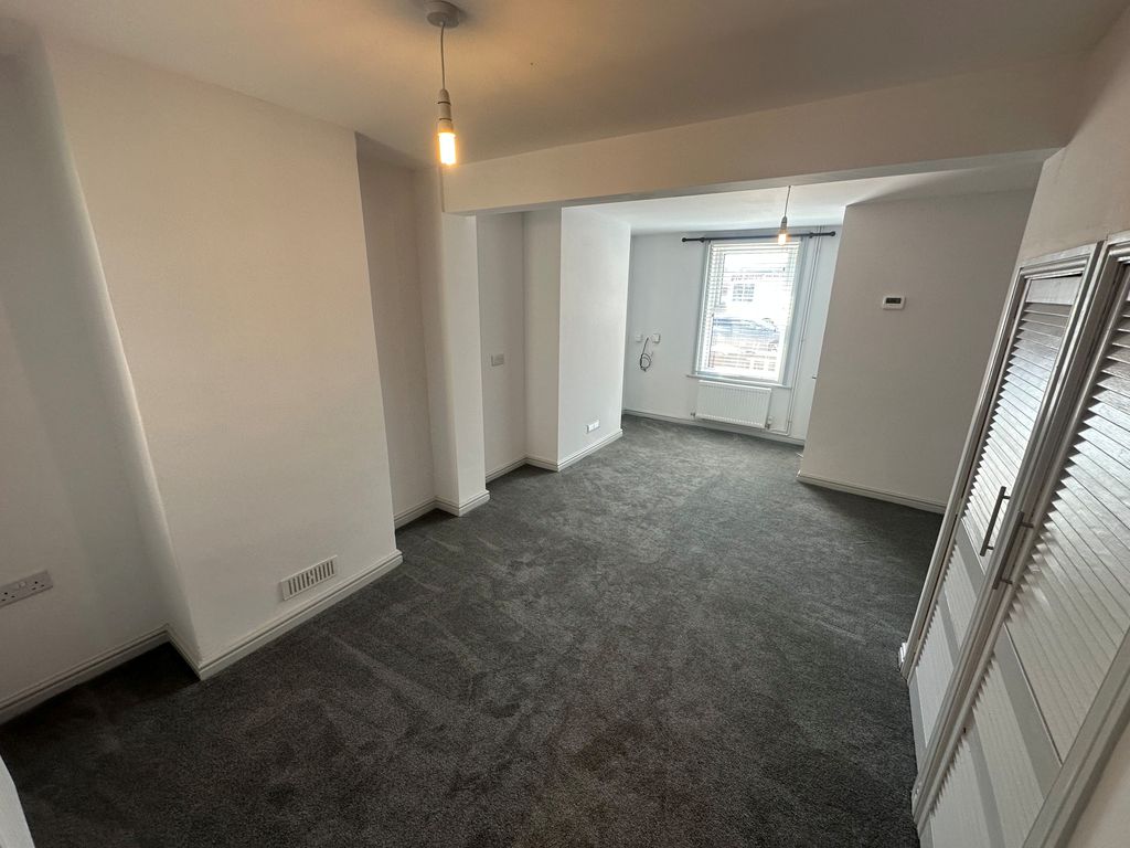 Property photo 3 of 8 Living Room