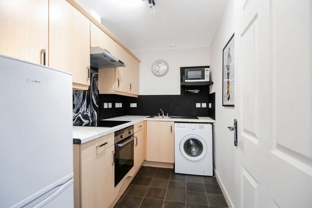 Property photo 3 of 13 Kitchen